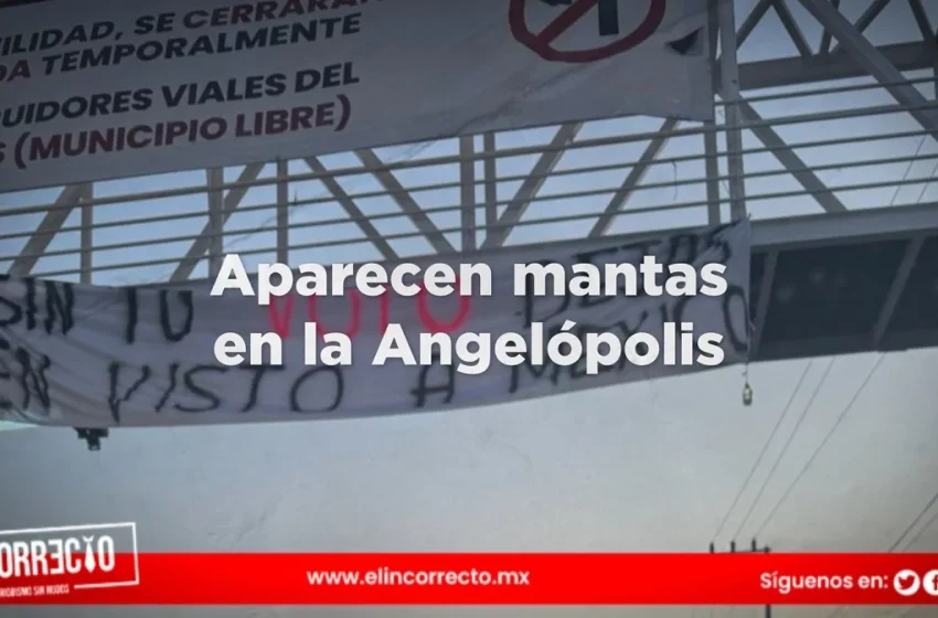  Colocan mantas en Puebla para llamar al voto