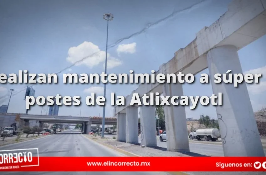  Dan mantenimiento a superpostes en la Vía Atlixcáyotl