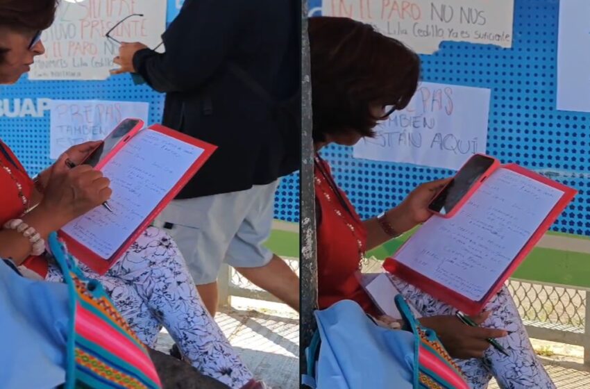  Docente de la BUAP imparte clases en línea desde la puerta 14 durante paro estudiantil