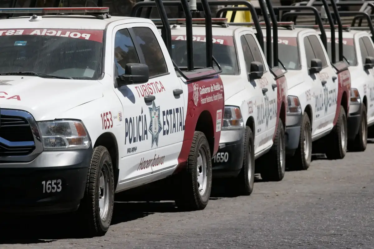 Policía se dispara por accidente en la Feria de Puebla