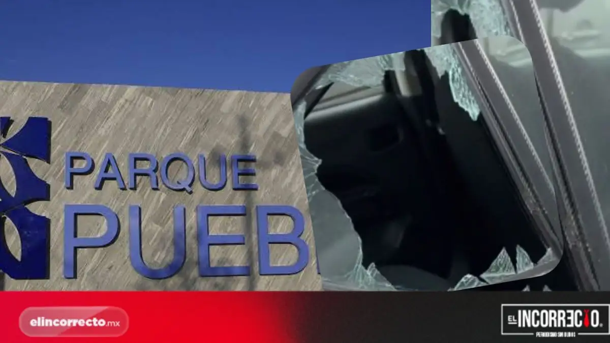 Dan cristalazo a un automóvil en el estacionamiento de Parque Puebla