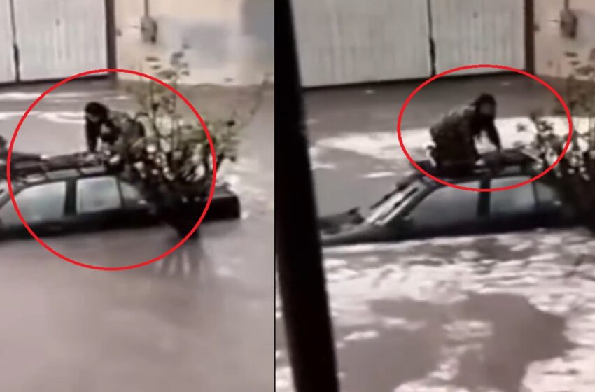  VIDEO Fuertes lluvias dejan escena impactante en Puebla: pareja trepa al techo de su coche